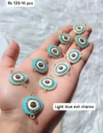 Light blue evil eye charm 319