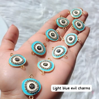 Light blue evil eye charm 319