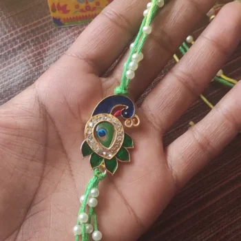 Peacock pearl rakhi 302