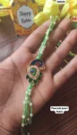 Peacock pearl rakhi 314