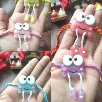 Hanging legs rakhi 455